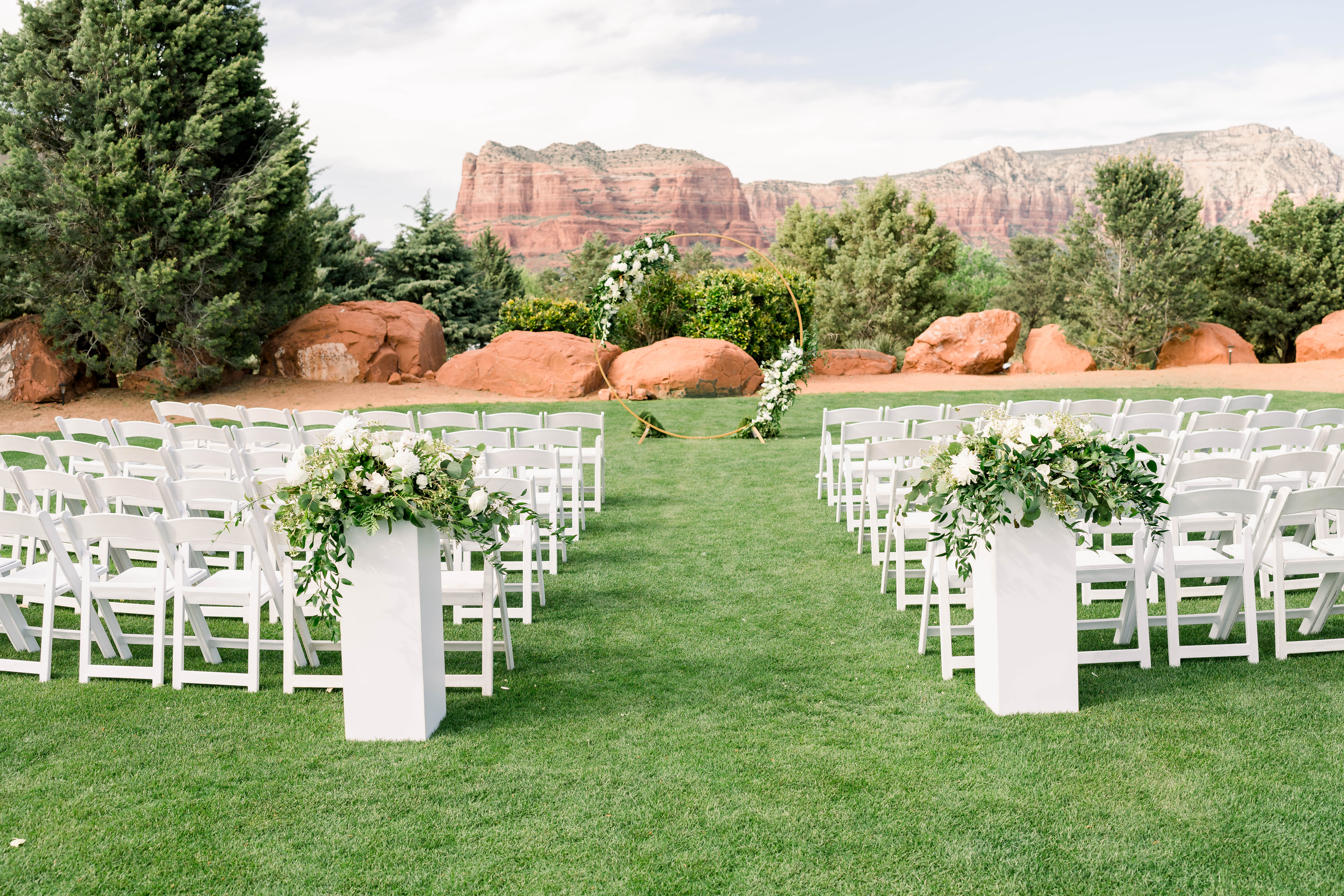 picture of ceremony with red rock backdrop 